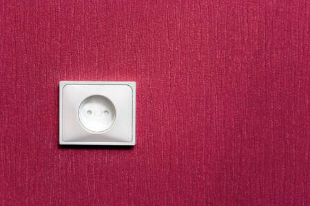 electric socket in the red wallの写真素材
