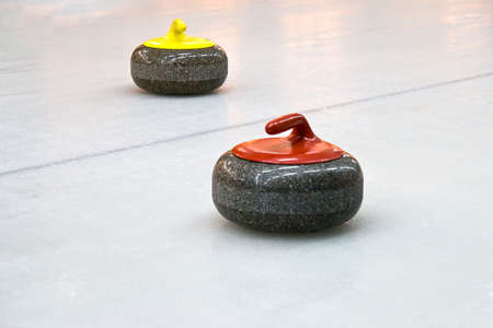 Granite stones for curling game on the iceの写真素材