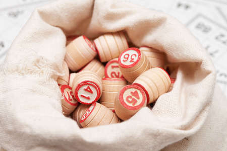 bag with wooden lotto-casks closeupの写真素材