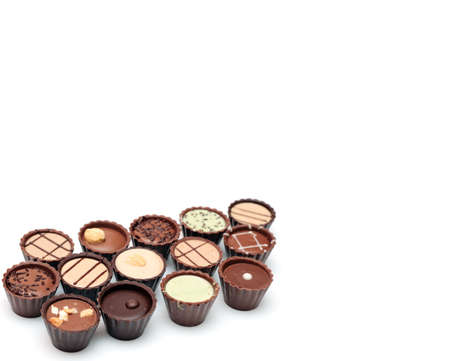 Mixed Chocolates against a white background with copy space( candy basket )の写真素材