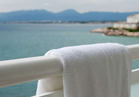 Pure white towel hangs on a balconyの写真素材