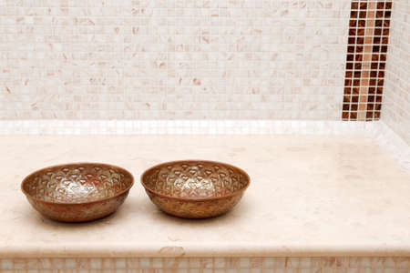 copper bowls in turkish bathの写真素材
