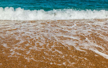 waves lapping on the sandy shore