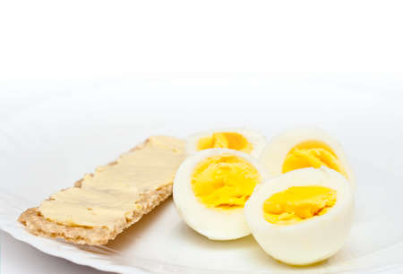 Boiled Egg and Toast with butter  Breakfast on white