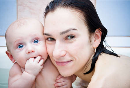 Mum and baby in a bathroom