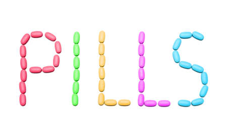 the word "pills" from colored tablets on whiteの写真素材