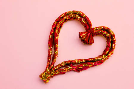 One valentine heart on pink background の写真素材