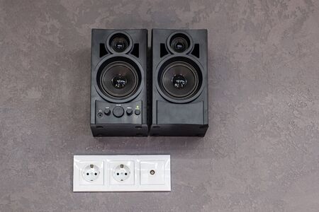 black music speakers hanging on the wall.の写真素材