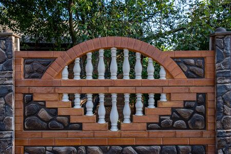 decorative stone fence with baluster