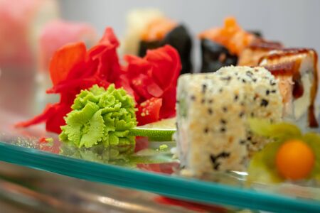 Fresh sushi rolls with great variety. Selective focus on middle . catering.の写真素材