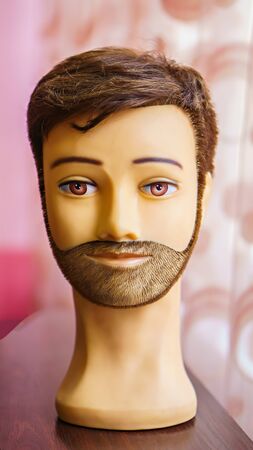 rubber head mannequin for learning hairstyles and beards.の写真素材