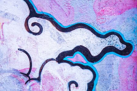 Street art. Colorful graffiti on the wall. Fragment for background. Detail of a graffiti.の写真素材