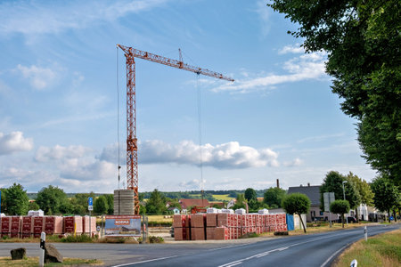Germany, Dresden, Circa 2022. Mobile construction crane at the construction site. Start of construction.のeditorial素材