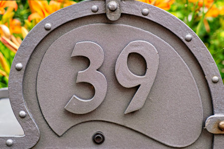 Close-up of a metal sign with house number 39 in Germany.の写真素材