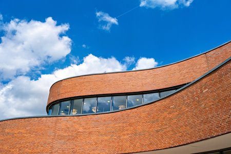Red brick building with sky background.の写真素材