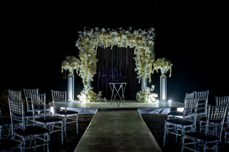 Stage set up for wedding ceremony with white flowers and greenery.の写真素材