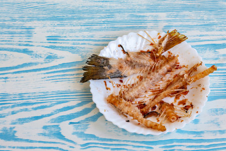 This is an image of a plate with what appears to be a seafood dishの写真素材