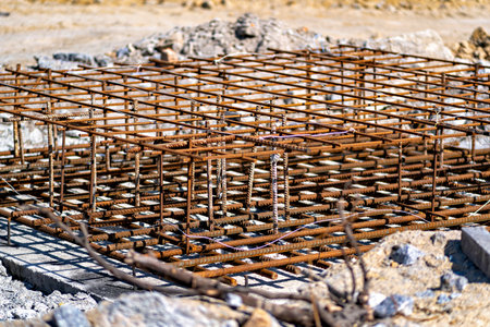 This image shows a construction site with a metal frame which appears to be part of a scaffolding structureの写真素材