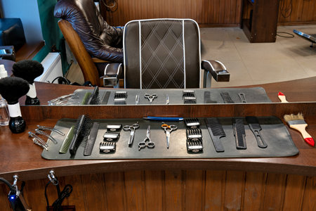 A barber shop with a mirror and tools on a counter