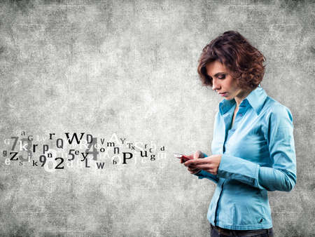 Girl with phone and letters flying forwardの写真素材