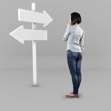 Girl before a white roadsign in fear of the unknown