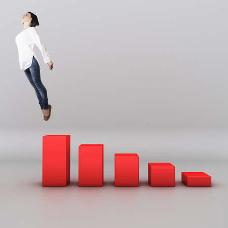 Beautiful girl jumping on top of the diagrammeの写真素材