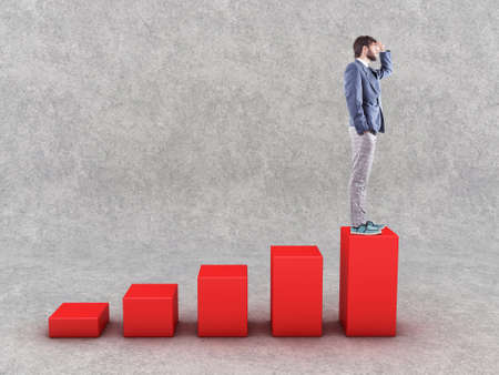 Beautiful boy stand on diagramme and looks aheadの写真素材