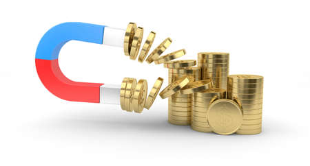 Magnet draws to itself gold coins on a white backgroundの写真素材