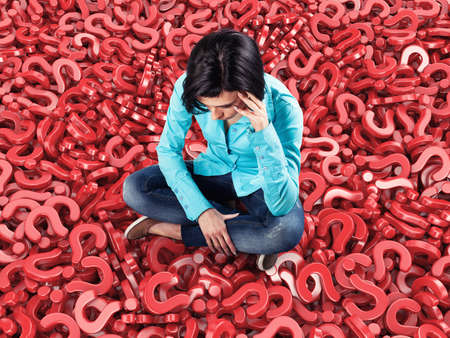 3d illustration of girl sits among many red questionsの写真素材