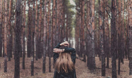 Photo of a beautiful girl, located in the forestの写真素材