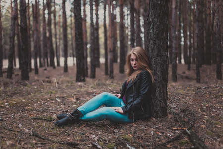 Photo of a beautiful girl, located in the forestの写真素材