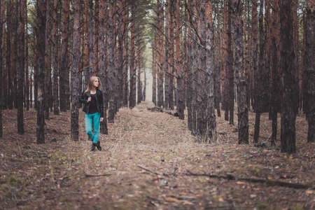 Photo of a beautiful girl, located in the forestの写真素材