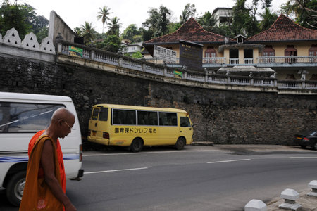 Monk on the street of Kandy city.のeditorial素材