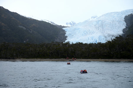 Disembarkation of tourists from the cruise ship to the Aguila glacier in southern Patagonia.のeditorial素材