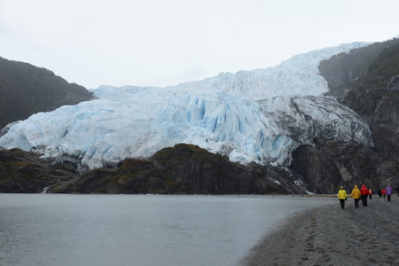 Tourists at the foot of the Aguila glacier. Tierra Del Fuegoのeditorial素材