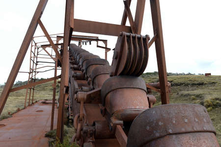 Abandoned gold mine at lake Lago Blanco. English mechanical dredge was engaged in gold mining from...