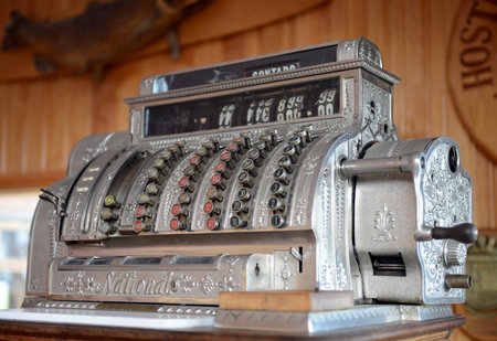 Vintage cash register at the hotel Hosteria Las Lengas in Tierra del Fuego.のeditorial素材