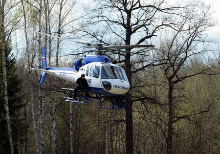 SWAT fighters on a police helicopter AS-355.のeditorial素材