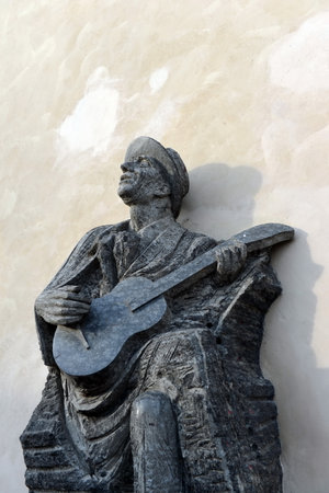 Monument to the Czech musician and actor Carel Gashler on an old castle ladder in Prague.のeditorial素材