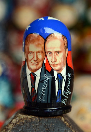 Matryoshka depicting Russian President Vladimir Putin and the 45th President of the USA of Donald trump on the counter of Souvenirs in Moscow.のeditorial素材