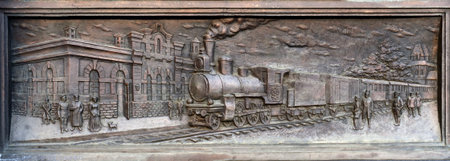 The bas-reliefs of the pedestal of the monument to Savva Mamontov near the railway station Yaroslavl Main.のeditorial素材