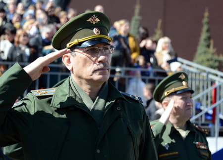 Officer during the national anthem on the red square during the General rehearsal of the parade dedicated to the 72nd anniversary of the Victory in the Great Patriotic War.のeditorial素材