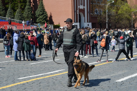 The cynologist with a guard dogのeditorial素材