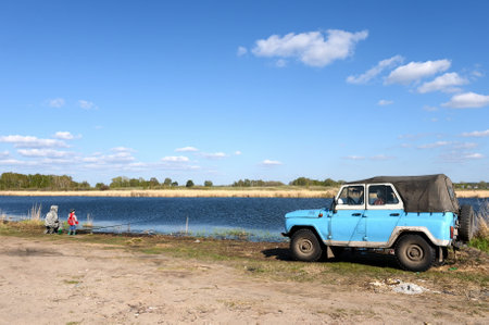 Fishermen on the Big Ostrovoye lake in the Mamontovsky district of the Altai Territory.のeditorial素材