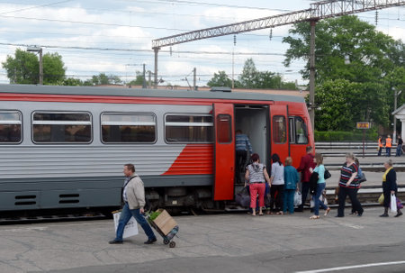 Passengers boarding in the RA-1 rail bus at Bryansk station.のeditorial素材