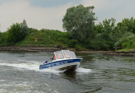A water police patrol patrols the Oka River.のeditorial素材