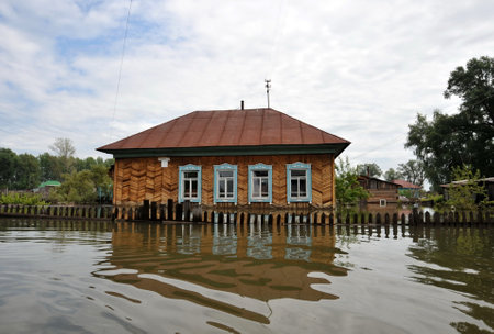 Flood. The river Ob, which emerged from the shores, flooded the outskirts of the city.のeditorial素材