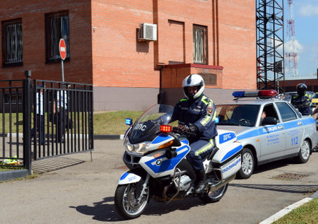 Inspectors of traffic police on motorcycles go on patrolling roads.のeditorial素材