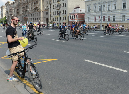 Cyclists ride on the Moscow bicycle around the Garden Ring.のeditorial素材