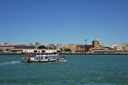 Ships in the harbor of the seizure of Cadiz on the shores of the Cadiz Bay of the Atlantic Ocean.